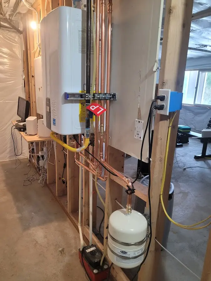 Licensed plumber repairing a kitchen sink in Homestead